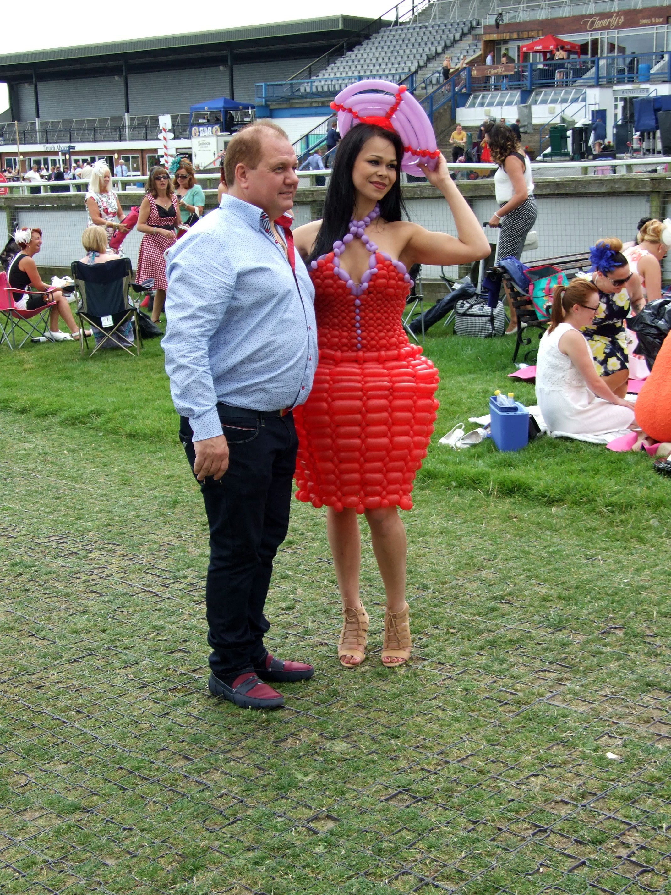 Model in a red balloon dress at Beverley races