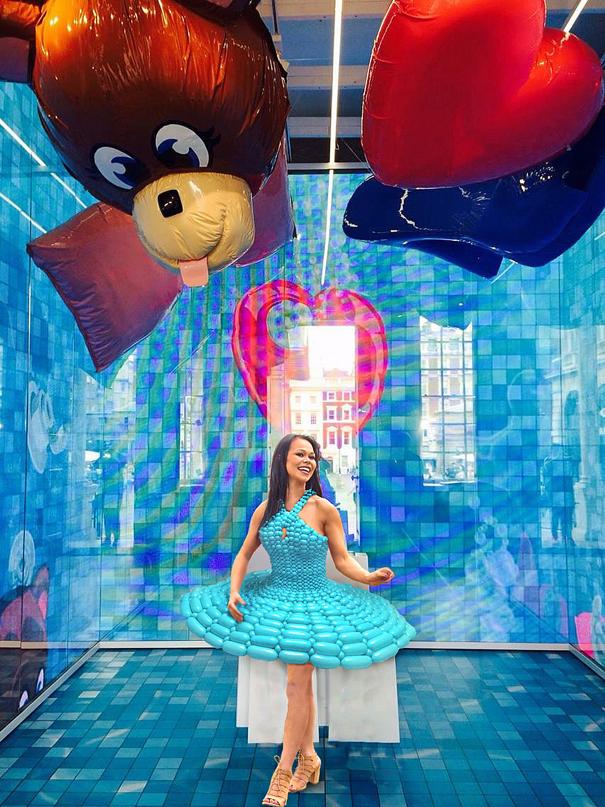 model in cyan balloon dress in Melissa Galleria London