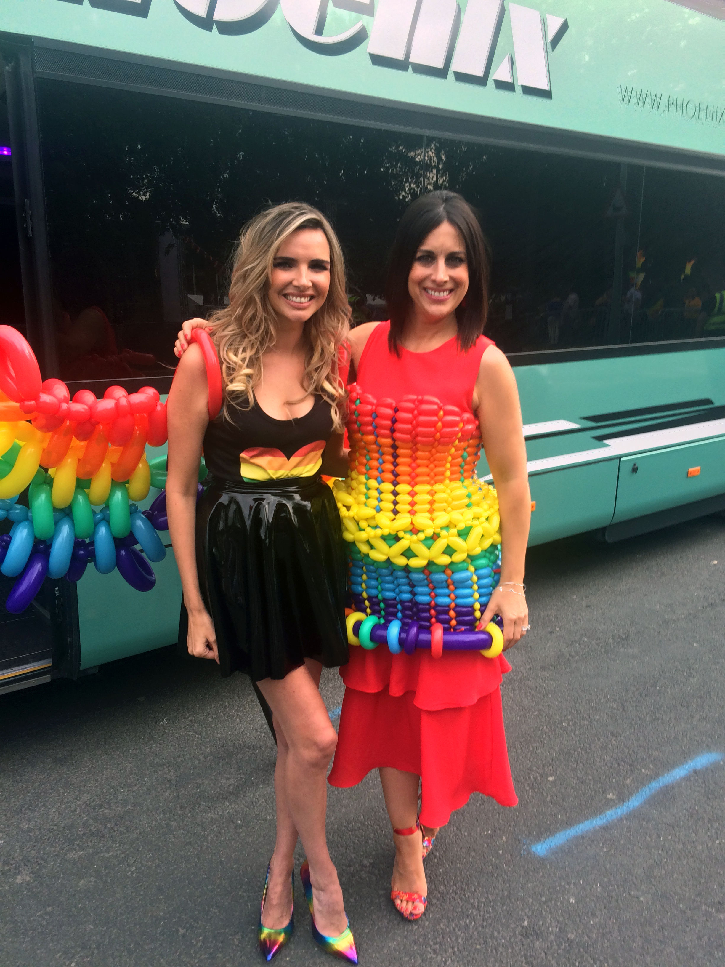 Nadine Coyle wearing balloon pride wings and Lucy Kennedy wearing balloon pride dress